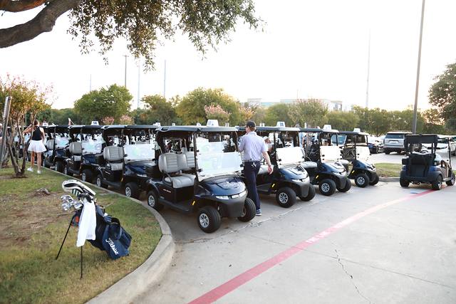 Golf carts lined up and ready for the shotgun start