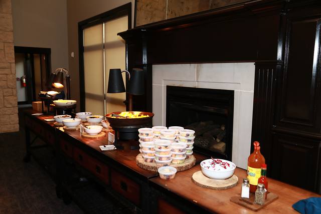 The breakfast spread beside the clubhouse fireplace