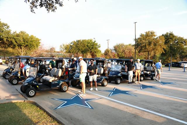 Carts lined up beside the Cowboys stars on the pavement