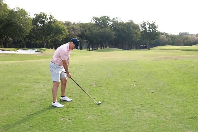 A player hitting from the fairway