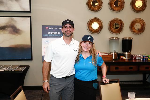 A sponsor from S3 posing with an MCBA team member
