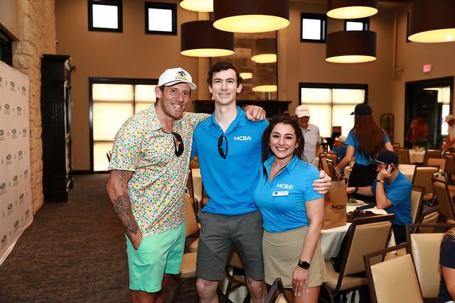 Three guests posing together during lunch