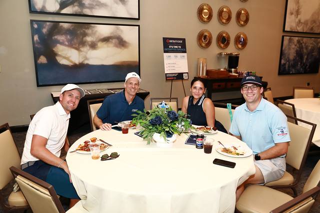 Players at a lunch table in the clubhouse