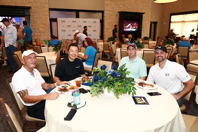 Players at a round table during lunch