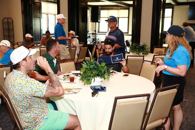 Players finishing lunch at their table