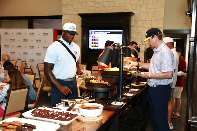 Players at the barbecue buffet