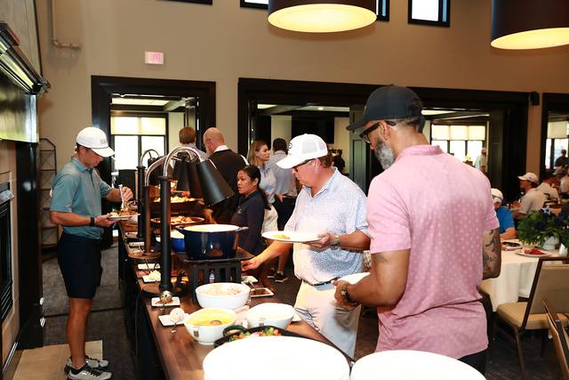 Guests going through the buffet line
