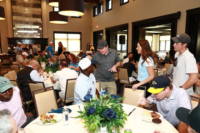 Players laughing at their table