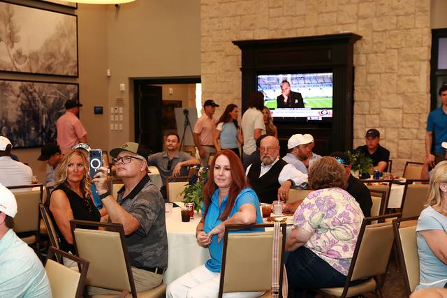 Guests at their tables during the program