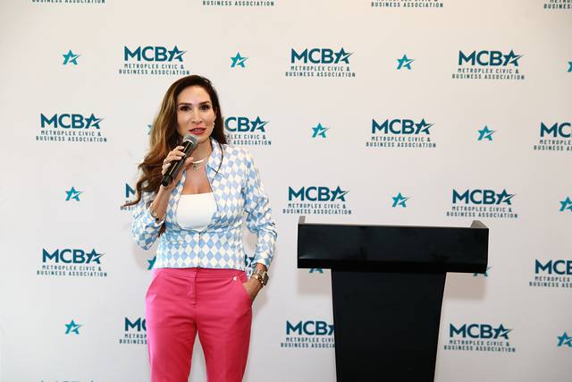 A speaker at the MCBA podium
