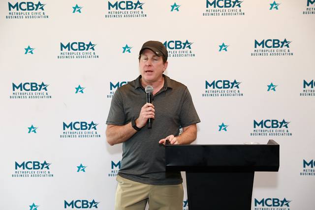 A speaker at the MCBA podium