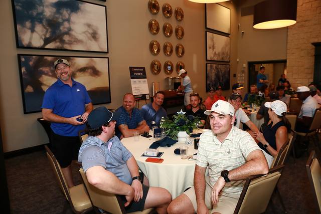 Players watching the awards from their table