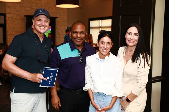 Four guests posing at the After Party