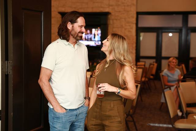Two guests talking at the After Party